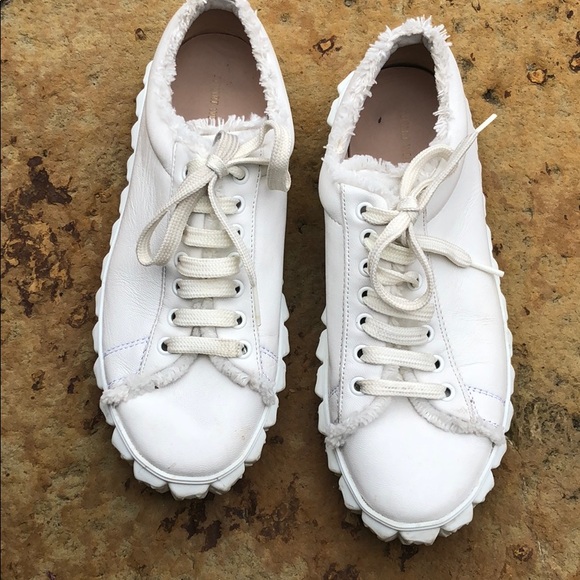 stuart weitzman fringe sneakers
